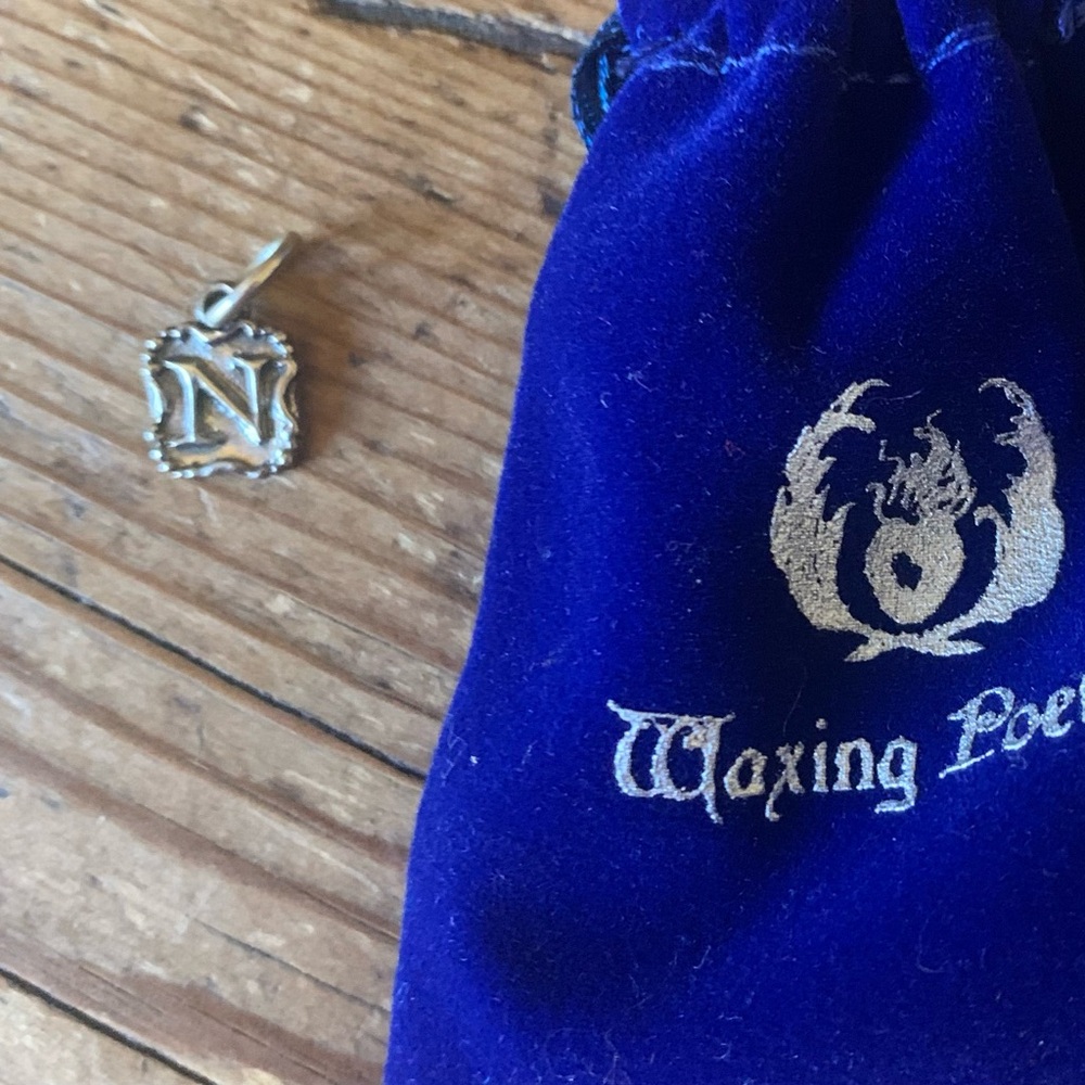 Waxing Poetic Crest Insignia “N” Charm